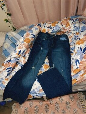 Levi's Dark Blue Bootcut Jeans with Subtle Distressing